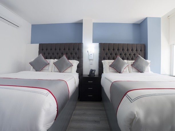 Imagen de la habitación del Hotel Suites Arboleda 215. Foto 6