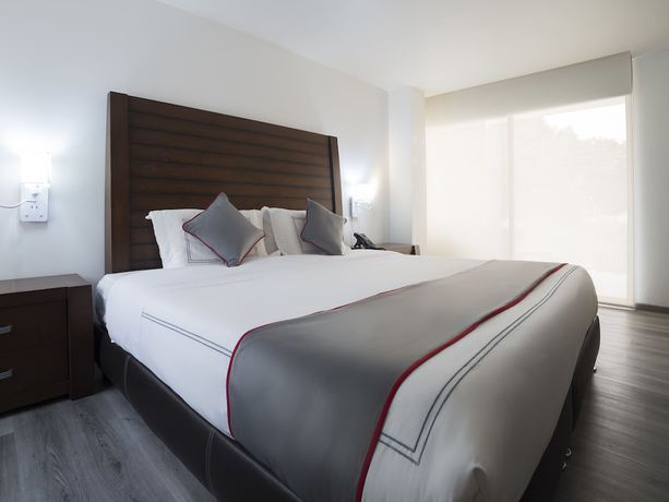 Imagen de la habitación del Hotel Suites Arboleda 215. Foto 9