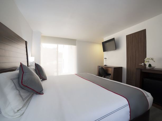 Imagen de la habitación del Hotel Suites Arboleda 215. Foto 11