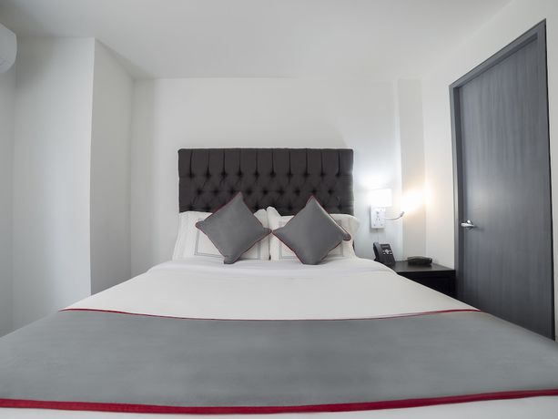 Imagen de la habitación del Hotel Suites Arboleda 215. Foto 13