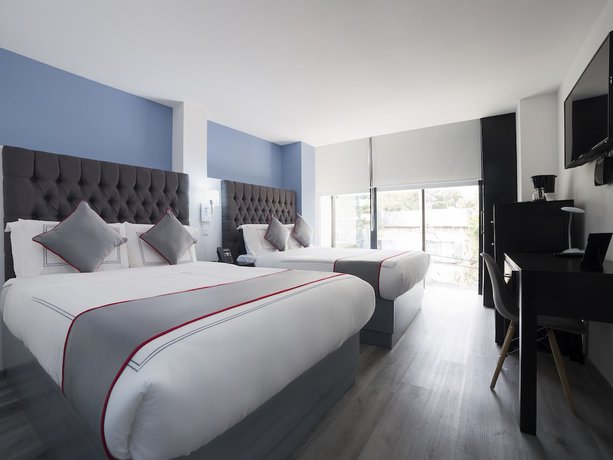 Imagen de la habitación del Hotel Suites Arboleda 215. Foto 19