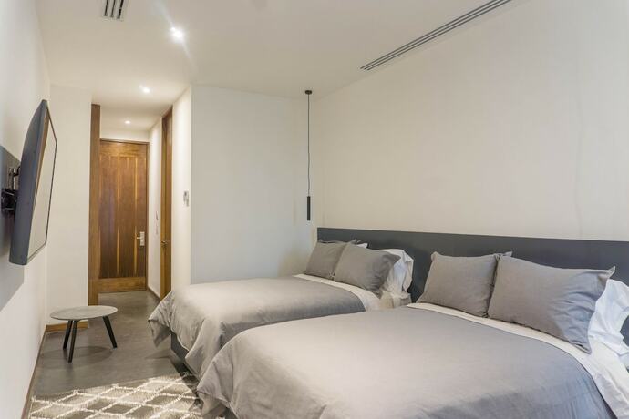 Imagen de la habitación del Hotel Suites BQ. Foto 11