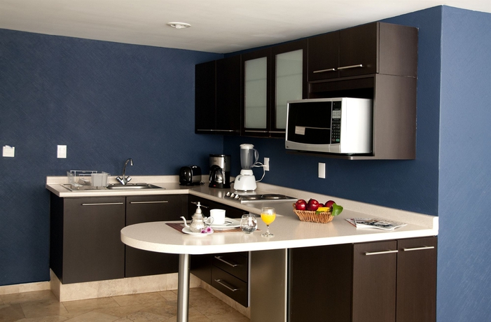 Imagen de la habitación del Hotel Suites Berna Doce. Foto 4