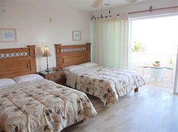 Imagen de la habitación del Hotel Suites Brisas. Foto 6