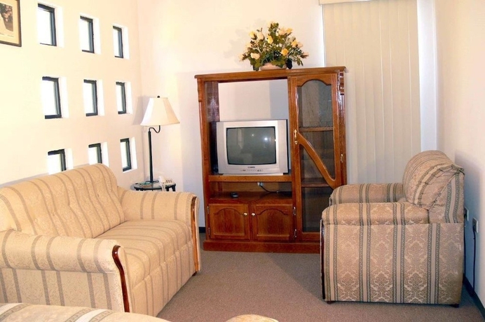 Imagen de la habitación del Hotel Suites Cervantes. Foto 13