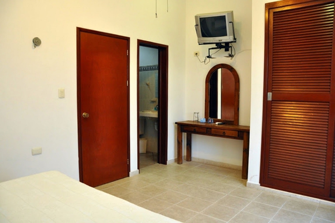 Imagen de la habitación del Hotel Suites Chac Chi. Foto 2
