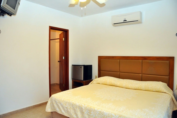 Imagen de la habitación del Hotel Suites Chac Chi. Foto 3