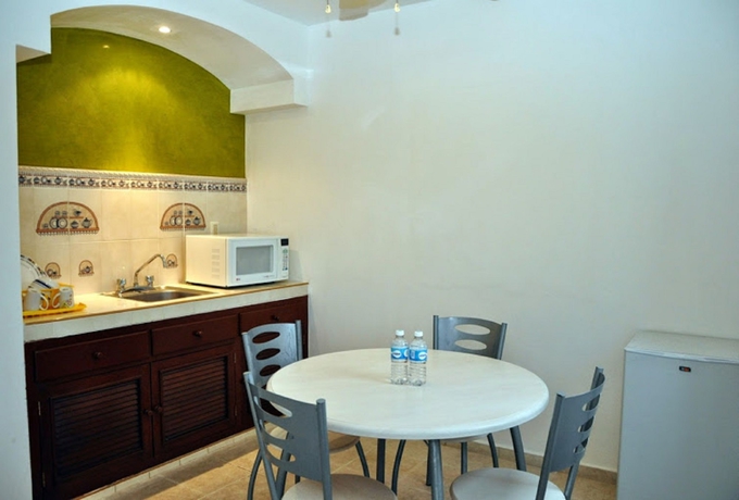 Imagen de la habitación del Hotel Suites Chac Chi. Foto 4