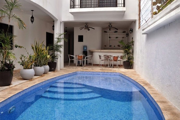 Imagen de la piscina del Hotel Suites Chac Chi. Foto 12
