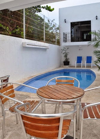 Imagen de la piscina del Hotel Suites Chac Chi. Foto 13