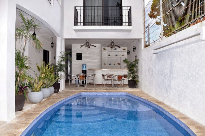 Imagen de la piscina del Hotel Suites Chac Chi. Foto 15