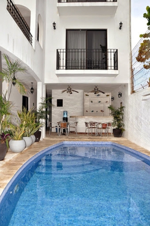 Imagen de la piscina del Hotel Suites Chac Chi. Foto 16