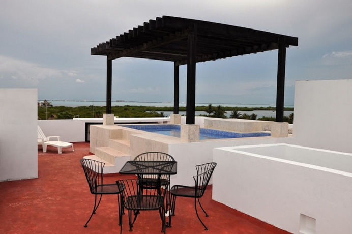 Imagen de los interiores del Hotel Suites Chac Chi. Foto 9