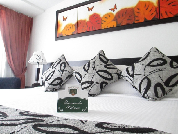 Imagen de la habitación del Hotel Suites Chico. Foto 7