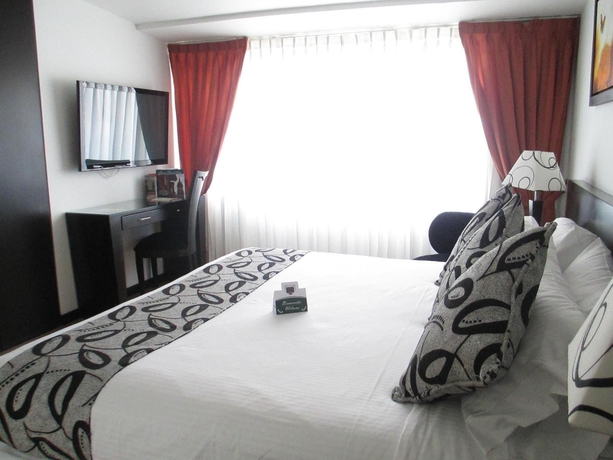 Imagen de la habitación del Hotel Suites Chico. Foto 8