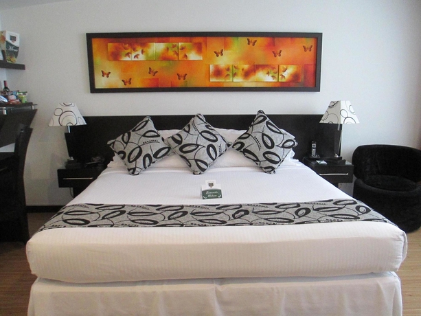 Imagen de la habitación del Hotel Suites Chico. Foto 9
