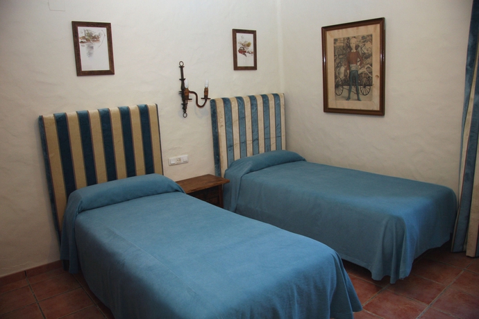 Imagen de la habitación del Hotel Suites Cortijo Fontanilla. Foto 9