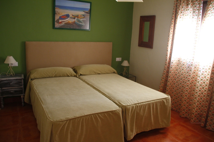 Imagen de la habitación del Hotel Suites Cortijo Fontanilla. Foto 11