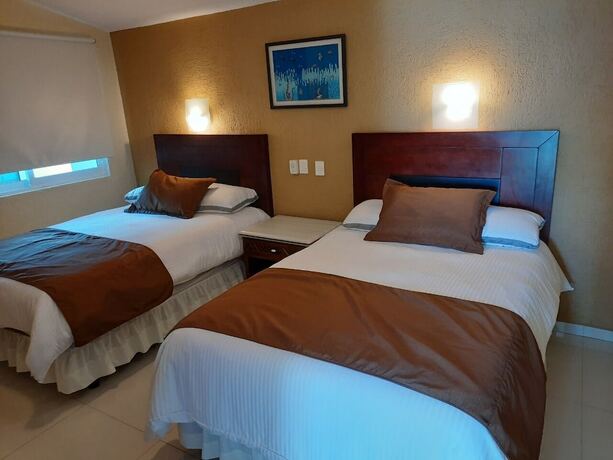 Imagen de la habitación del Hotel Suites Costa Dorada. Foto 15