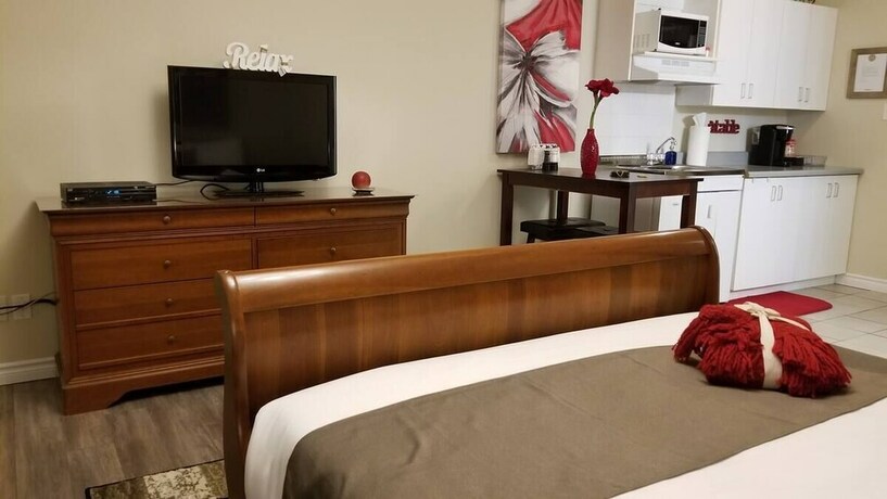 Imagen de la habitación del Hotel Suites De La Baie. Foto 19