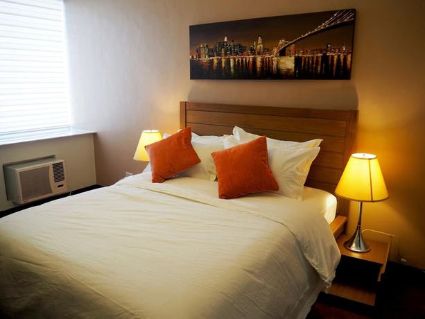 Imagen de la habitación del Hotel Suites De Marina Manila. Foto 3