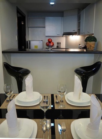 Imagen de la habitación del Hotel Suites De Marina Manila. Foto 4