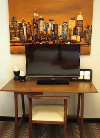 Imagen de la habitación del Hotel Suites De Marina Manila. Foto 5