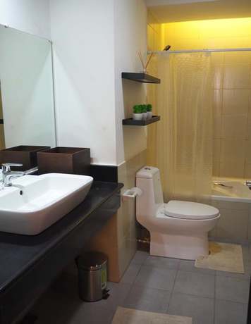 Imagen de la habitación del Hotel Suites De Marina Manila. Foto 9