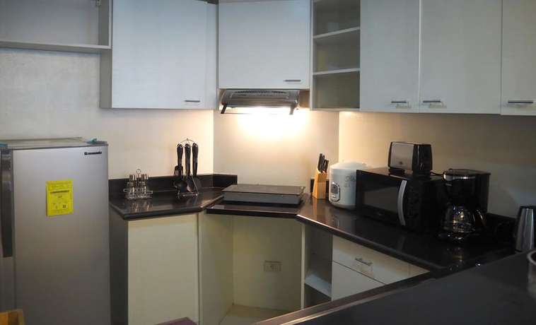 Imagen de la habitación del Hotel Suites De Marina Manila. Foto 11