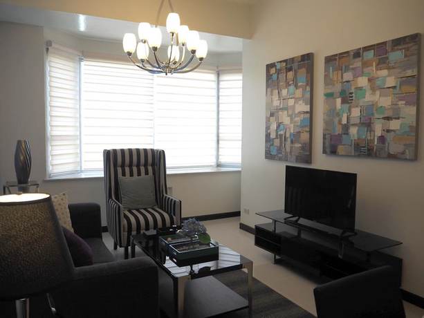 Imagen de la habitación del Hotel Suites De Marina Manila. Foto 12