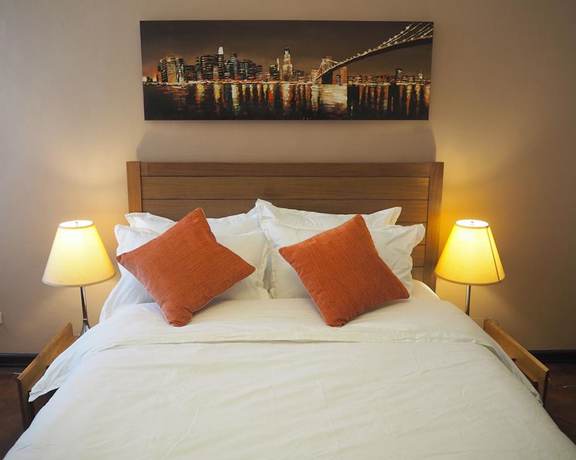 Imagen de la habitación del Hotel Suites De Marina Manila. Foto 13