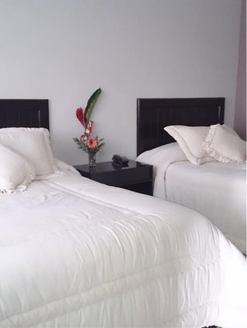 Imagen de la habitación del Hotel Suites Del Real. Foto 7