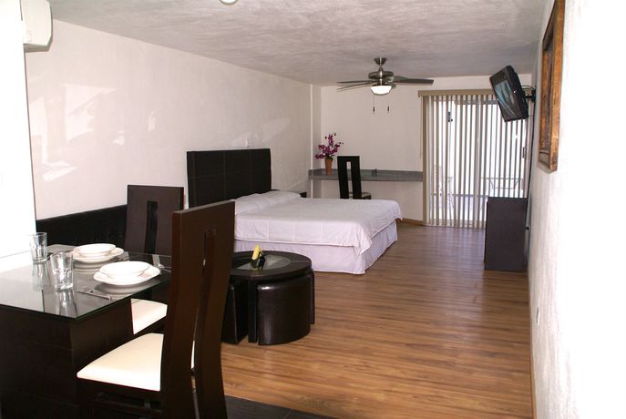 Imagen de la habitación del Hotel Suites Dioh. Foto 8