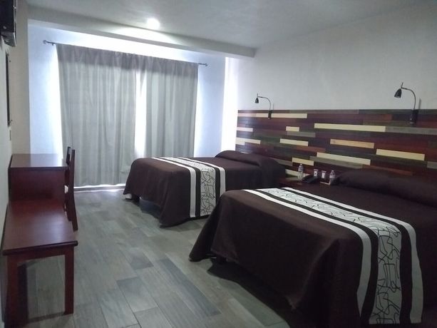 Imagen de la habitación del Hotel Suites Don Miguel. Foto 9