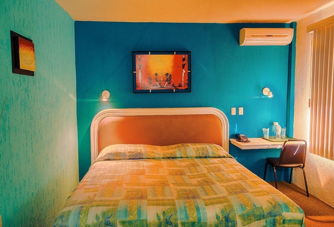 Imagen de la habitación del Hotel Suites Ejecutivas. Foto 19
