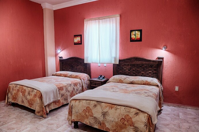 Imagen de la habitación del Hotel Suites Ejecutivas. Foto 20