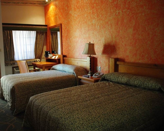 Imagen de la habitación del Hotel Suites El Paseo. Foto 9