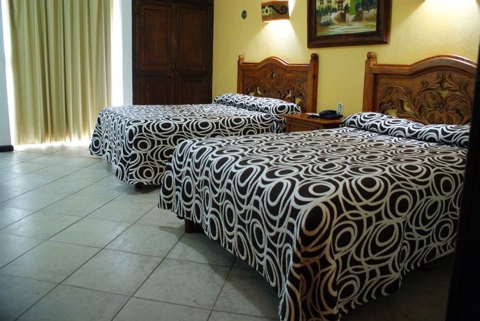 Imagen de la habitación del Hotel Suites Flamboyanes. Foto 3