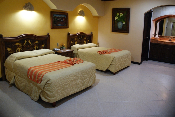 Imagen de la habitación del Hotel Suites Flamboyanes. Foto 4