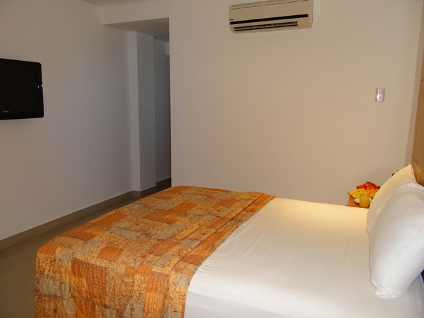 Imagen de la habitación del Hotel Suites Gaby. Foto 2