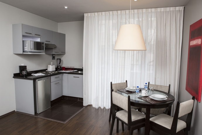 Imagen de la habitación del Hotel Suites Ganges. Foto 14
