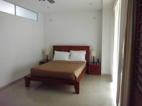 Imagen de la habitación del Hotel Suites House Juanambu Apartasuites. Foto 2