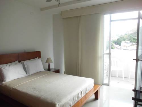 Imagen de la habitación del Hotel Suites House Juanambu Apartasuites. Foto 3
