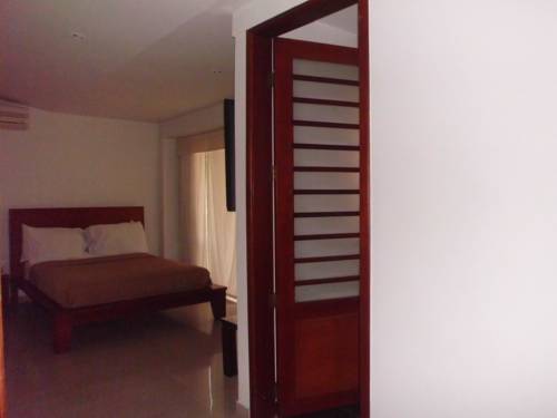 Imagen de la habitación del Hotel Suites House Juanambu Apartasuites. Foto 6