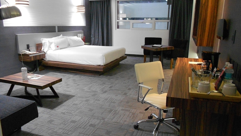 Imagen de la habitación del Hotel Suites Inn La Muralla Metepec. Foto 3