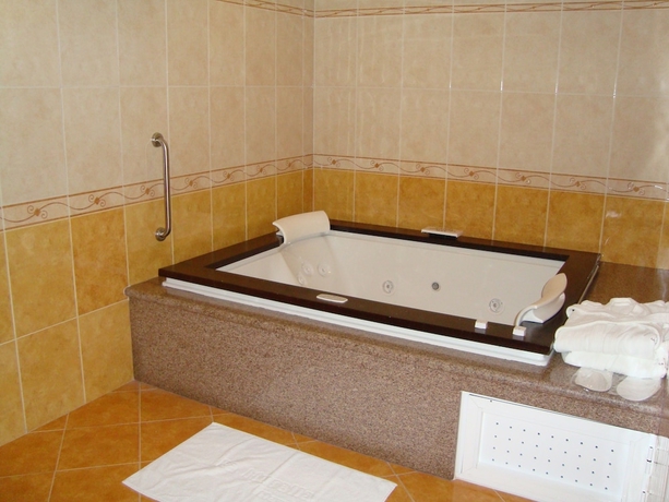 Imagen de la habitación del Hotel Suites Inn La Muralla Metepec. Foto 7