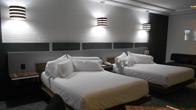 Imagen de la habitación del Hotel Suites Inn La Muralla Metepec. Foto 16
