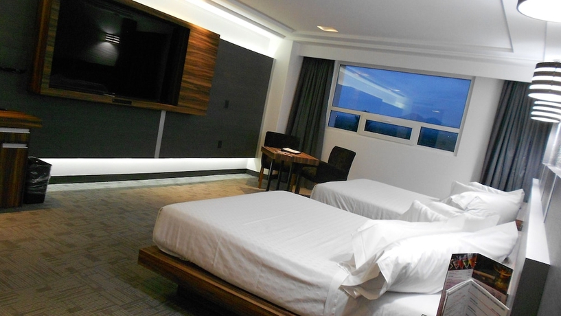 Imagen de la habitación del Hotel Suites Inn La Muralla Metepec. Foto 17