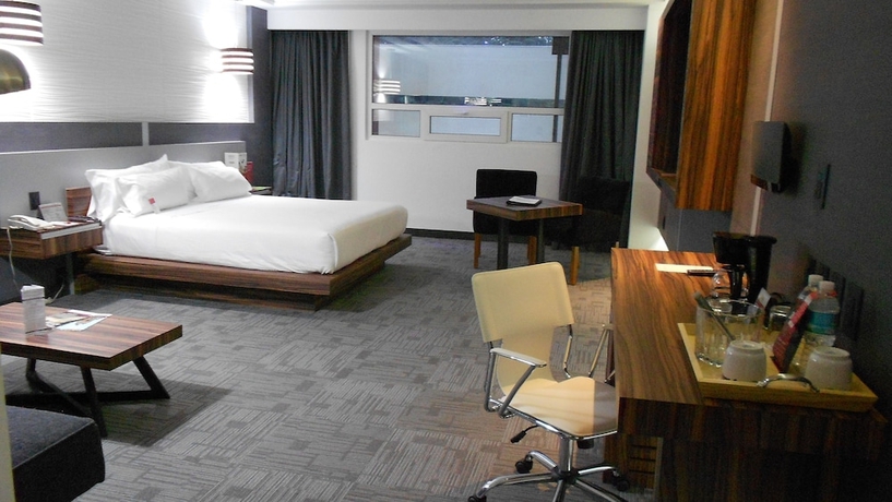 Imagen de la habitación del Hotel Suites Inn La Muralla Metepec. Foto 18