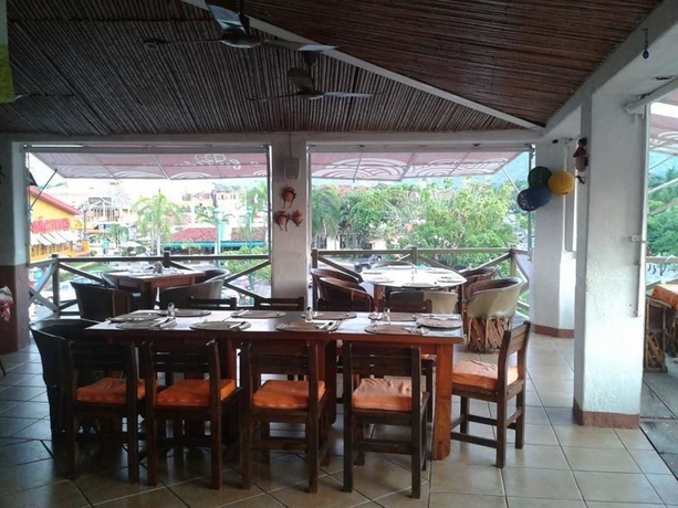 Imagen del bar/restaurante del Hotel Suites Ixtapa Plaza. Foto 1